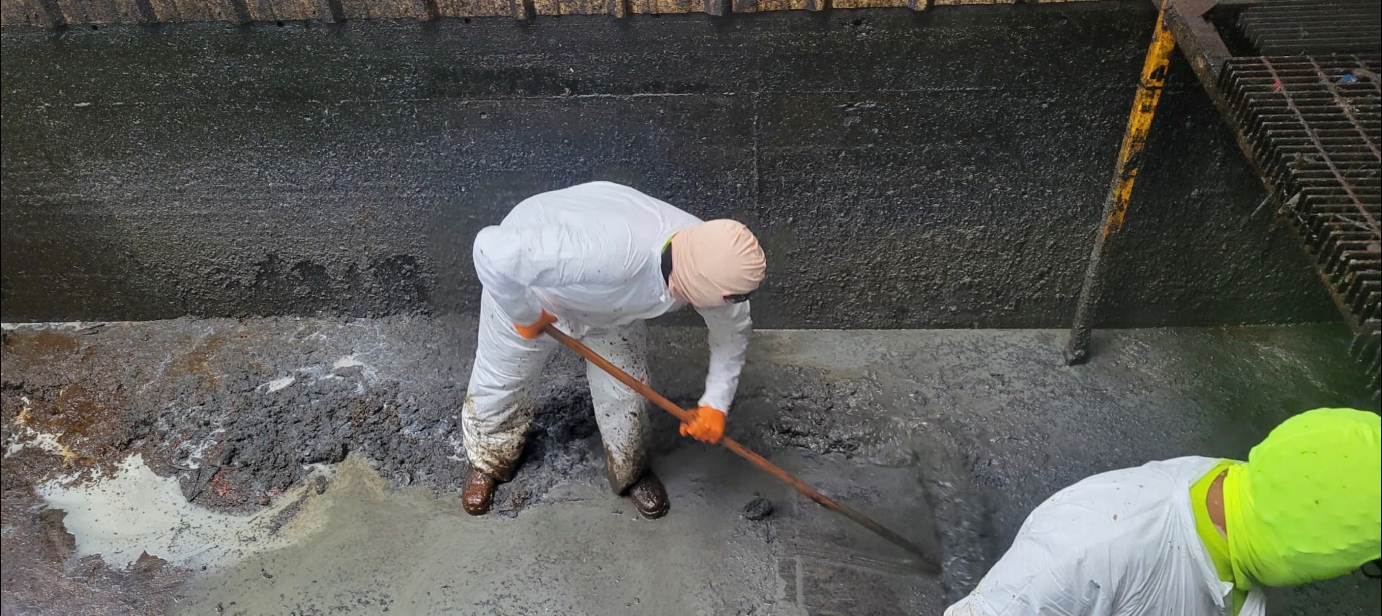 Global Envirotech environmental cleaning crew on an industrial site